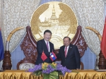 习近平同老挝人民革命党中央委员会总书记、国家主席本扬3.jpg - 粮食局